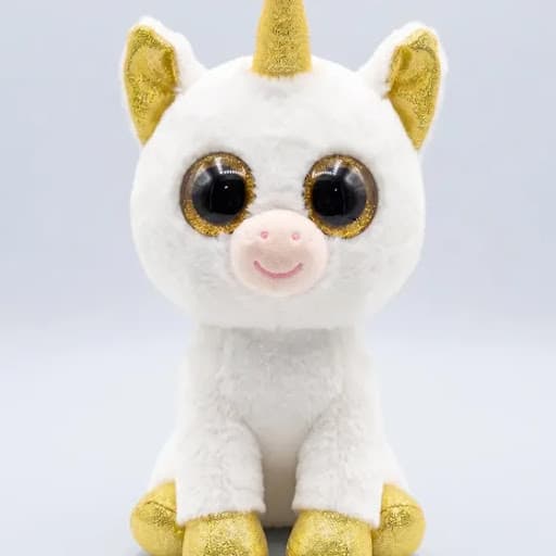 Pelúcia de unicórnio branco com chifre dourado